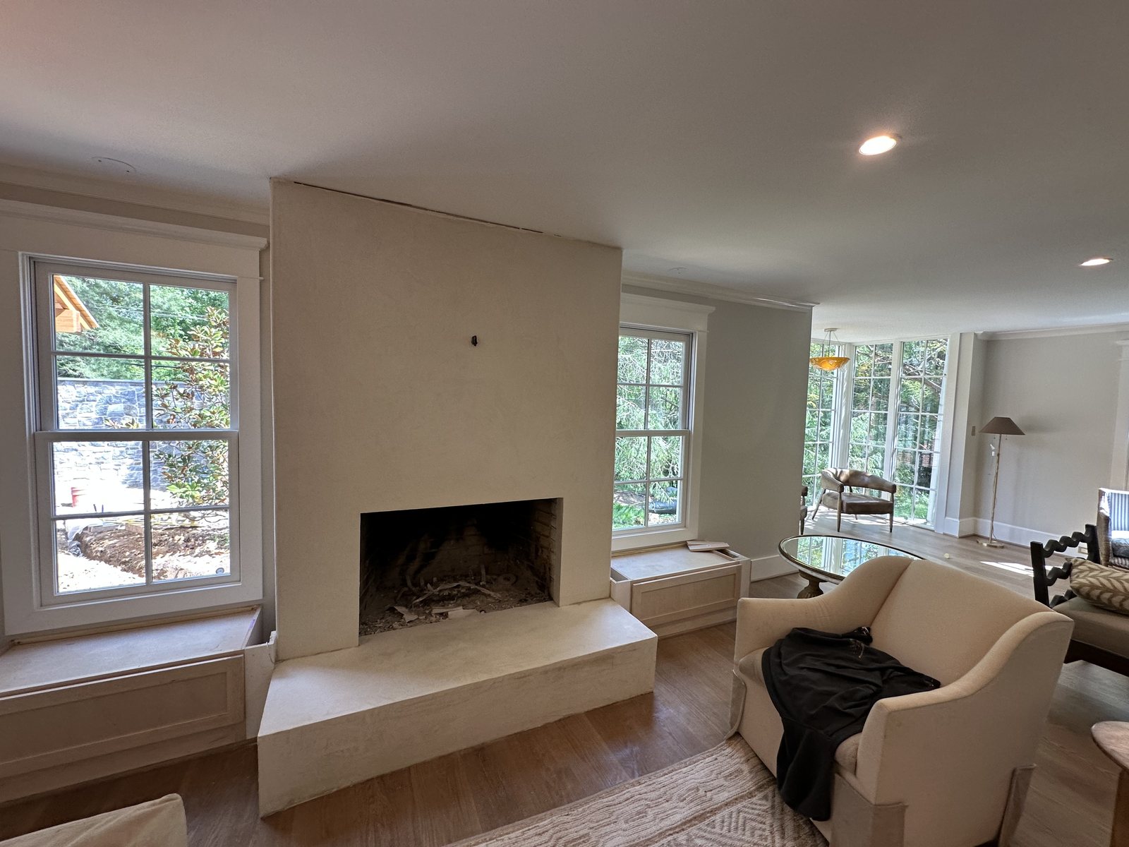 Cream lime plaster fireplace and full chimney breast