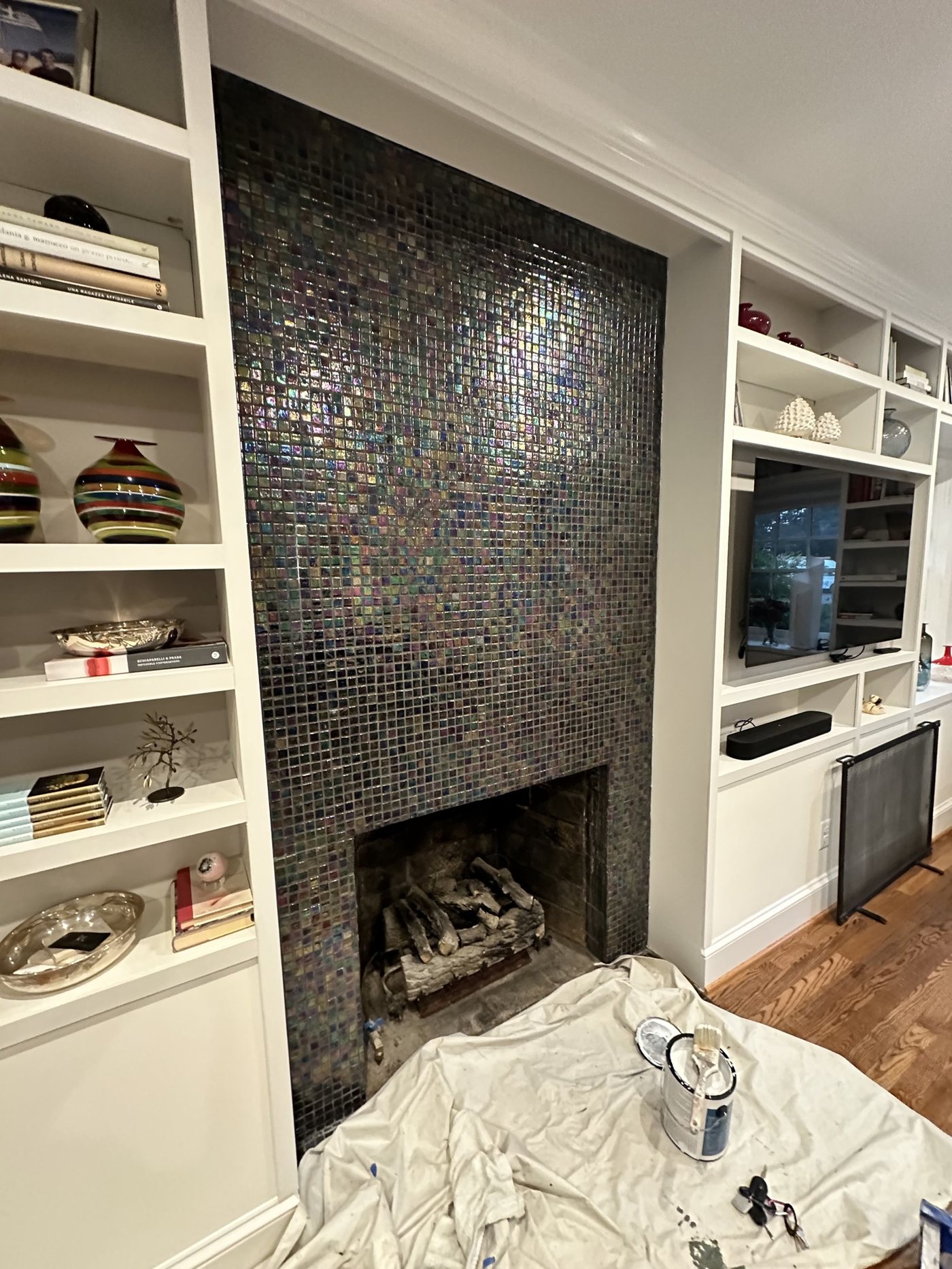 Mosaic tile fireplace before plaster